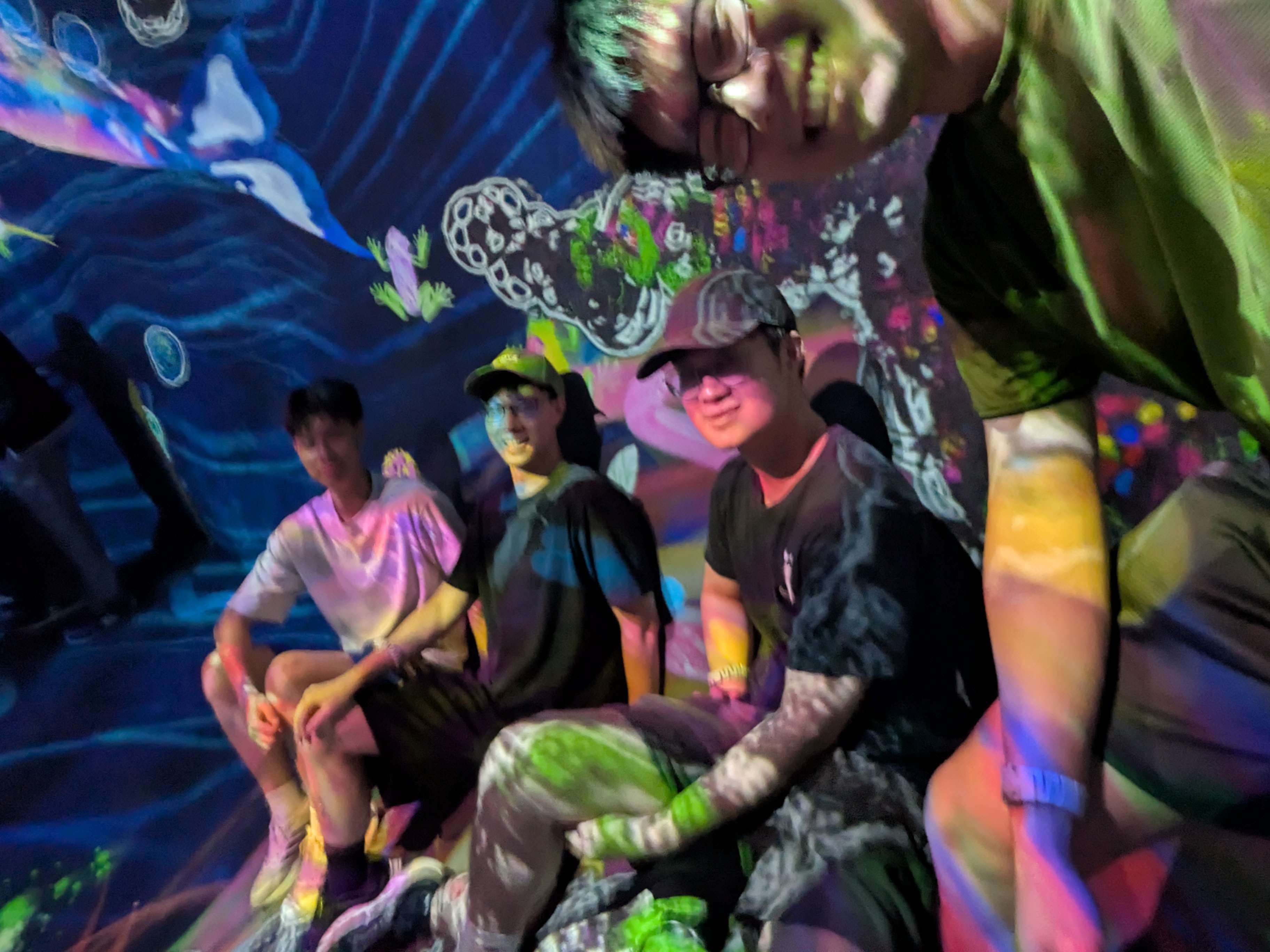 Sitting inside a projected light installation